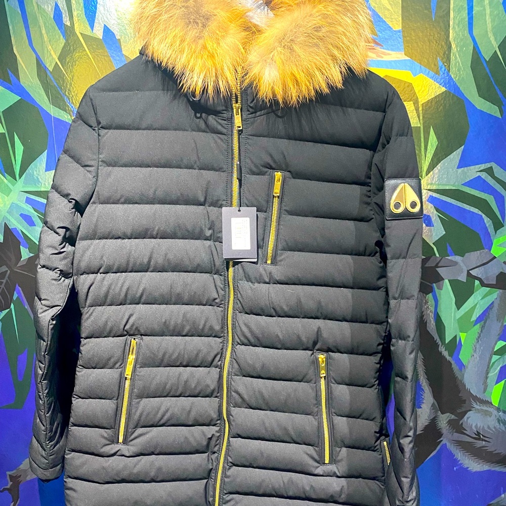 Women’s black down Moose Knuckle coat, fur hood